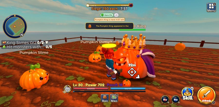A player fights the crowned Pumpkin King boss in the pumpkin patch while pumpkin slimes hop nearby, with the English game HUD.